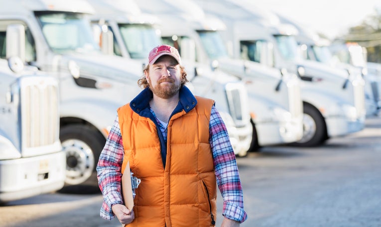 Man with a fleet in the background