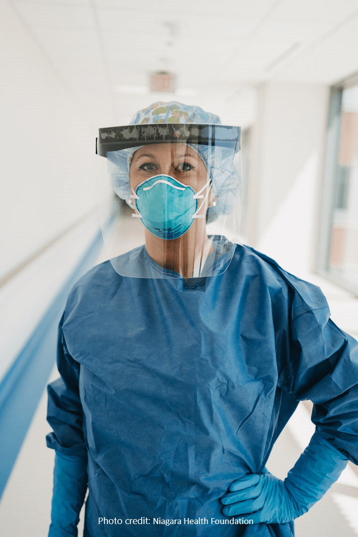 Woman Dressed in Full Protective Equipment