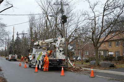 Alectra truck restoring power lines