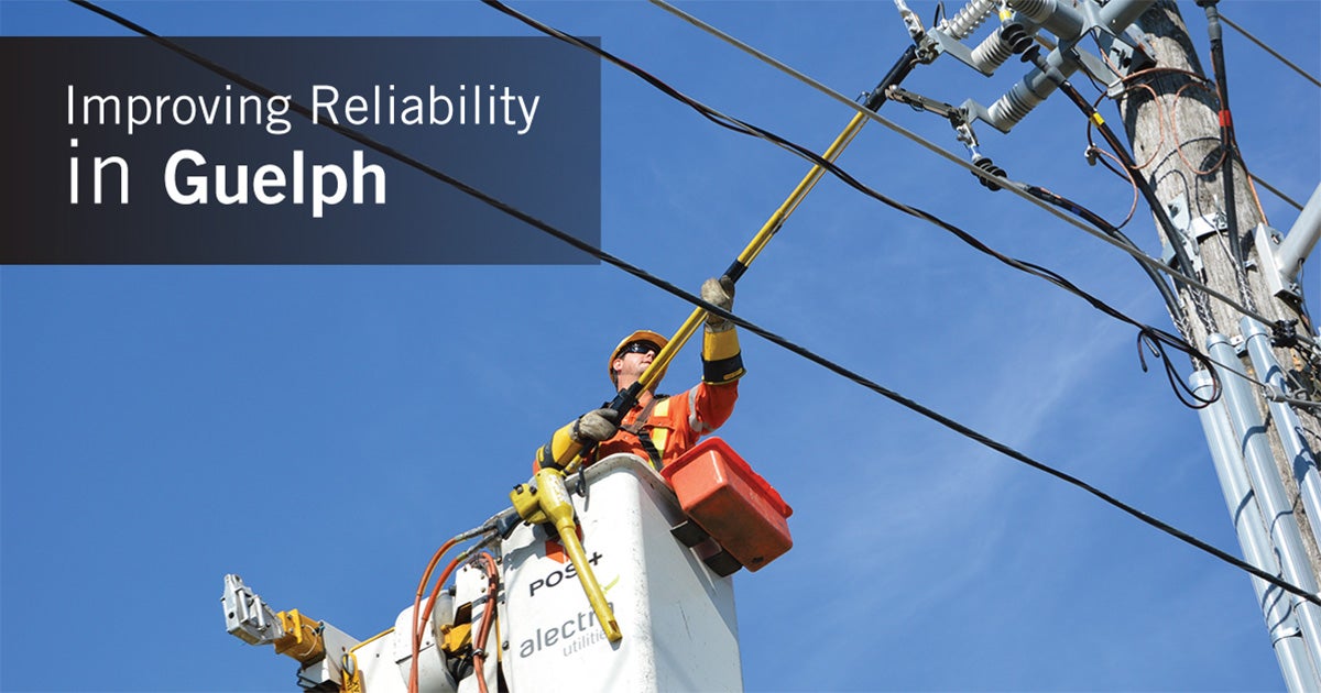 Improving Reliability in Guelph - Alectra employee working on powerlines