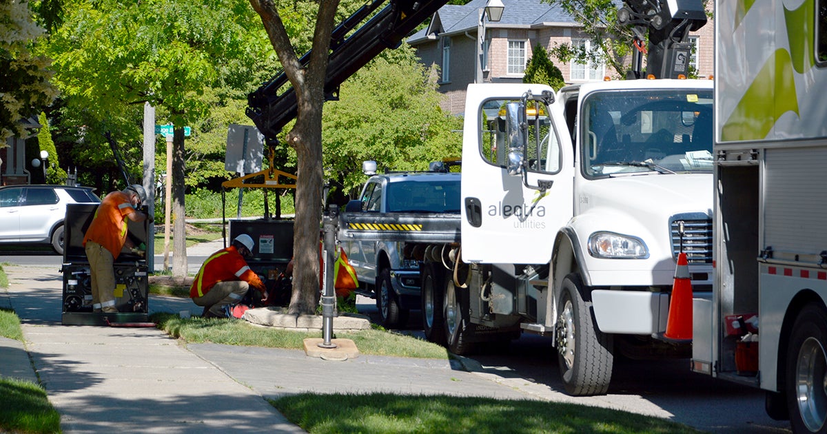 Improving Reliability in Markham - Image featuring Alectra truck and employees